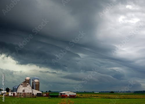Dramatic storm clouds above a midwest rural scene