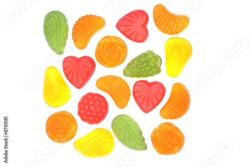 Multicolored candies isolated on white background.
