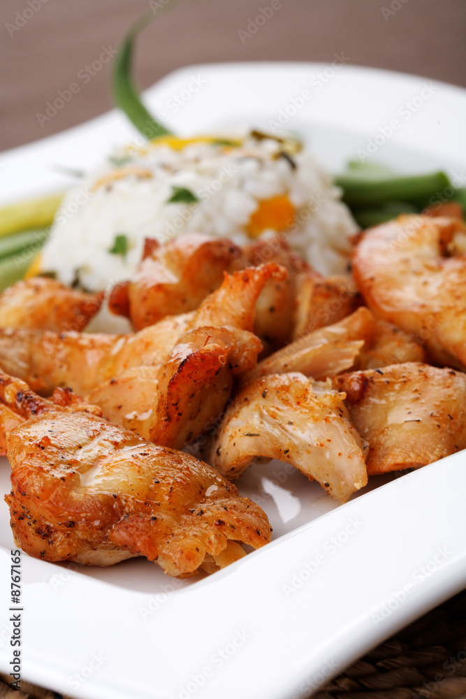 Grilled meat with rice and vegetables Grilled meat with rice and vegetables