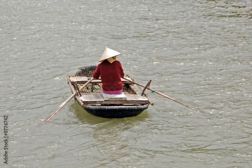 vietnamese woman rowing