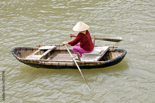 vietnamese woman rowing