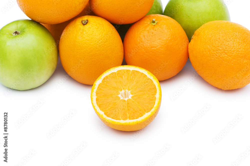 Apple and oranges isolated on the white background Apple and oranges isolated on the white background