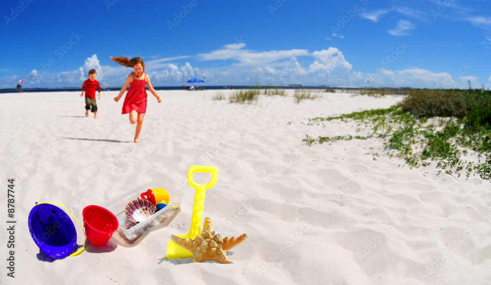 Children Running Towards Beach toys Children Running Towards Beach toys