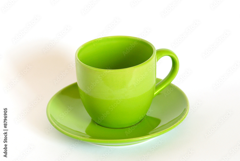 Green tea cup and saucer isolated on white. Green tea cup and saucer isolated on white.
