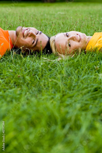 Couple Lying on the Grass