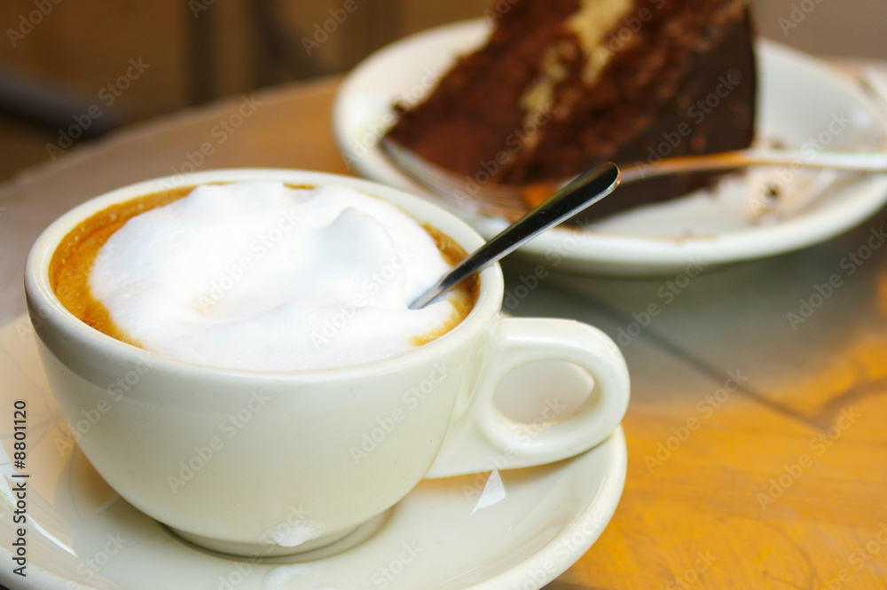 cup of coffee and a piece of chocolate cake cup of coffee and a piece of chocolate cake