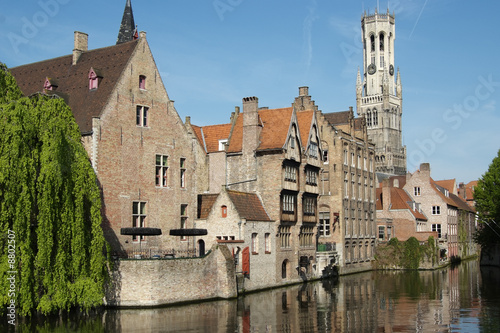 The Belfry behind rosary dock (Bruges) photo