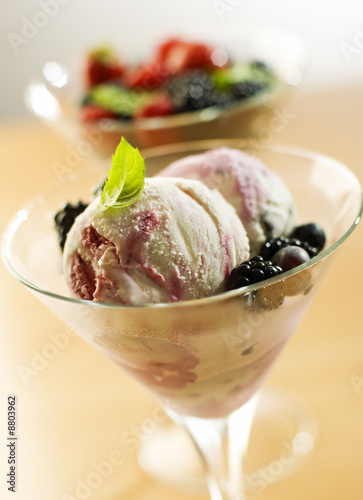 fresh mixed ice cream with berries close up