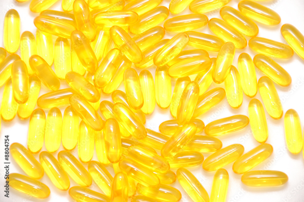 Yellow vitamins isolated on a white background Yellow vitamins isolated on a white background