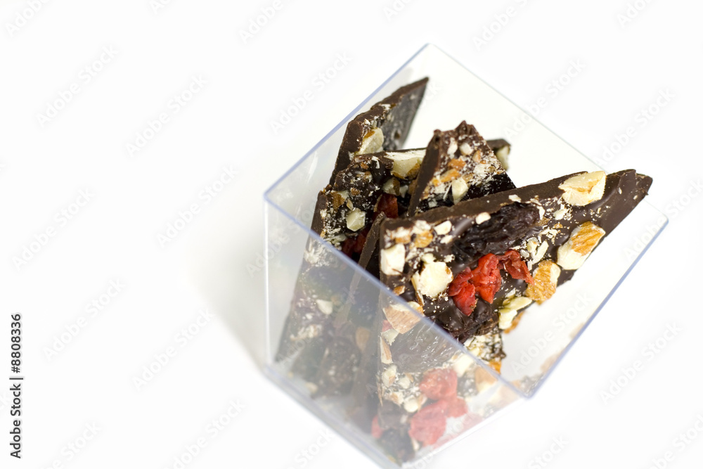 glass bowl full of chocolate slices glass bowl full of chocolate slices