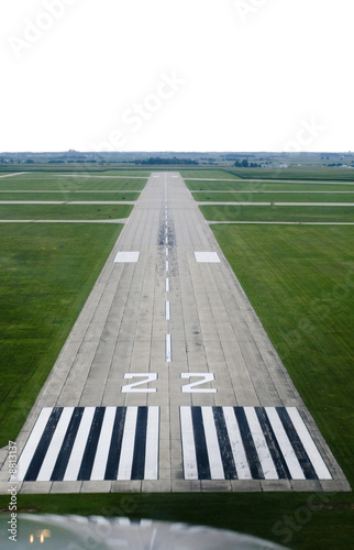 Looking down the runway of a rural airport.