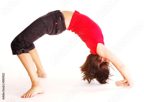 A young pretty slim woman doing excersise