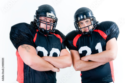Two American football players isolated on white background photo