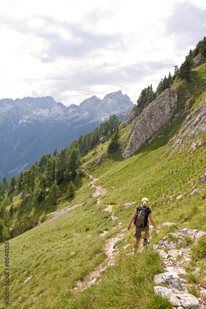 female hiking in the alps, slovenia