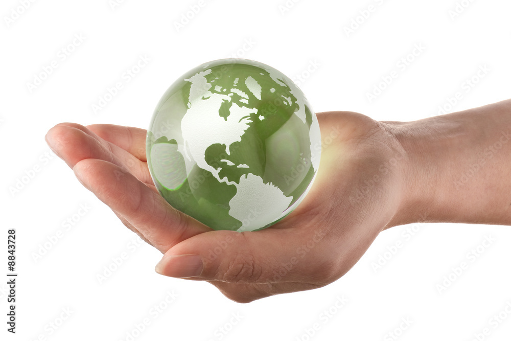 Protecting the earth concept, world in a womans hand Protecting the earth concept, world in a womans hand