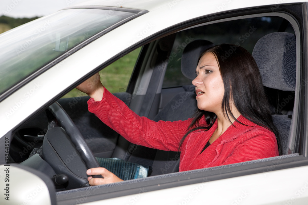 attractive brunette woman traveling by car attractive brunette woman traveling by car