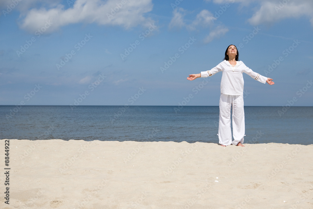 attractive brunette woman relaxing on the beach attractive brunette woman relaxing on the beach