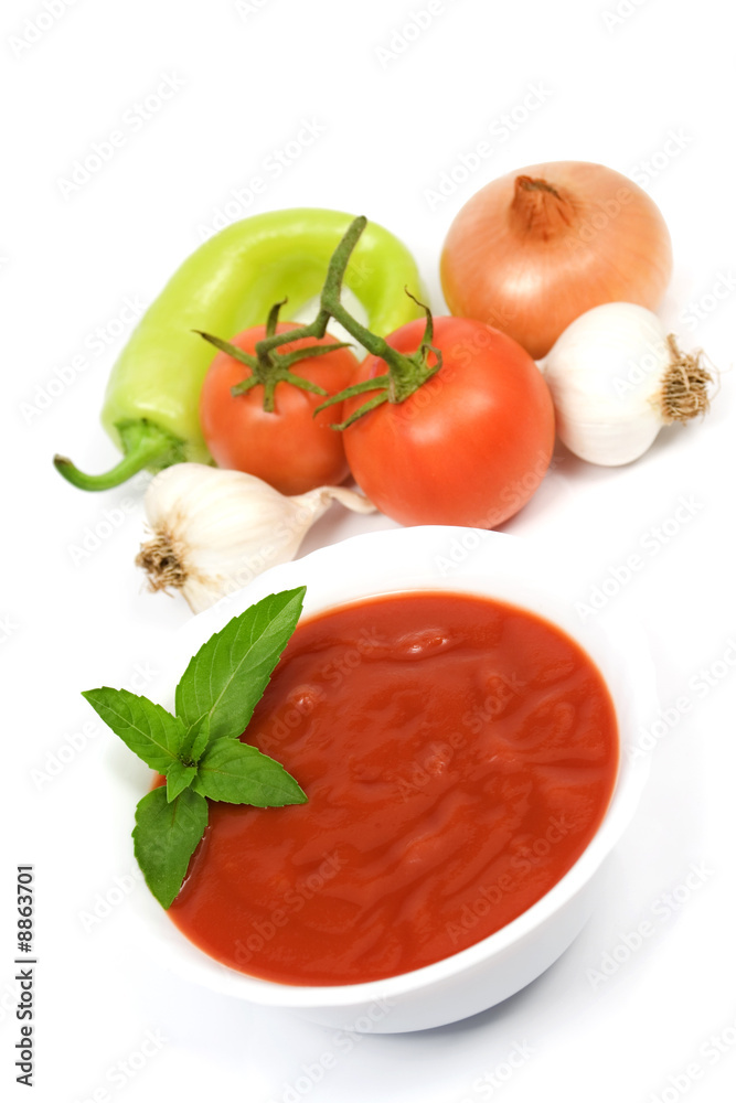 Tomato soup and vegetables isolated on white Tomato soup and vegetables isolated on white