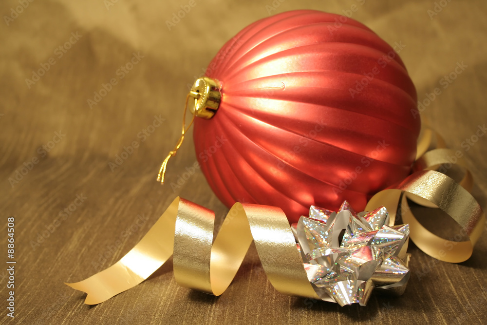 Christmas bows and ornaments on gold background Christmas bows and ornaments on gold background