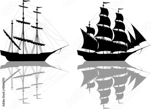 Two black old ships isolated on white