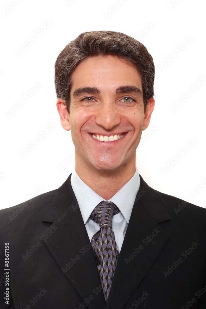 Businessman in dark suit smiling