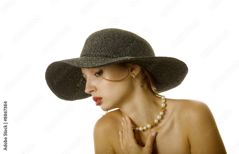 Sexy woman in hat and jewelry
