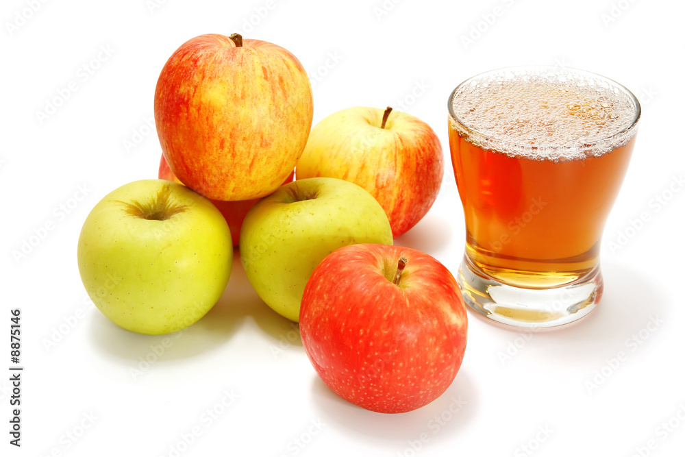 apples over white with full glass apples over white with full glass
