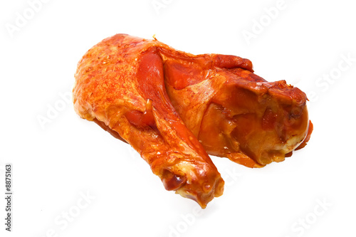 single chicken wing over white