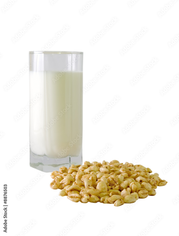 A glass of milk and a handful of popped rice A glass of milk and a handful of popped rice