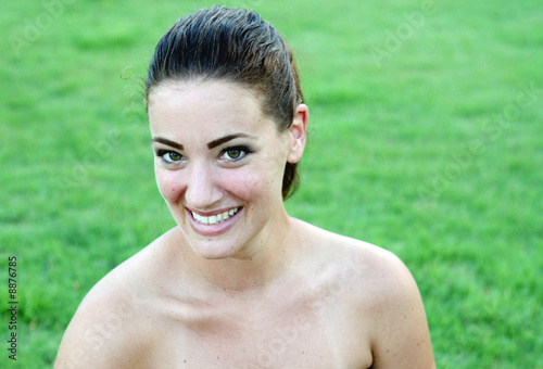 Portrait of a happy young brunette woman.