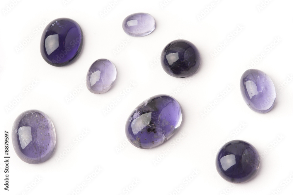 Jewelery stones - purple-blue iolite cabochons.