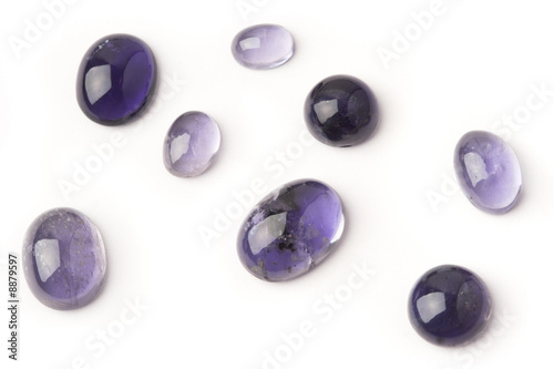 Jewelery stones - purple-blue iolite cabochons. photo