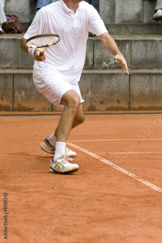 Tennis player with racket © L.F.otography