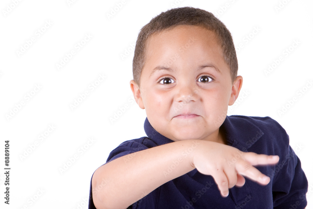 Happy mixed race boy giving hand gesture on white background Happy mixed race boy giving hand gesture on white background