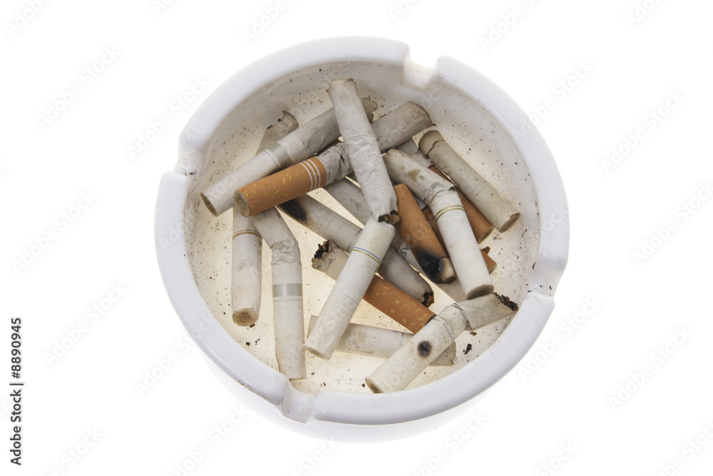 Cigarette Butts on Ash Tray on White Background Cigarette Butts on Ash Tray on White Background