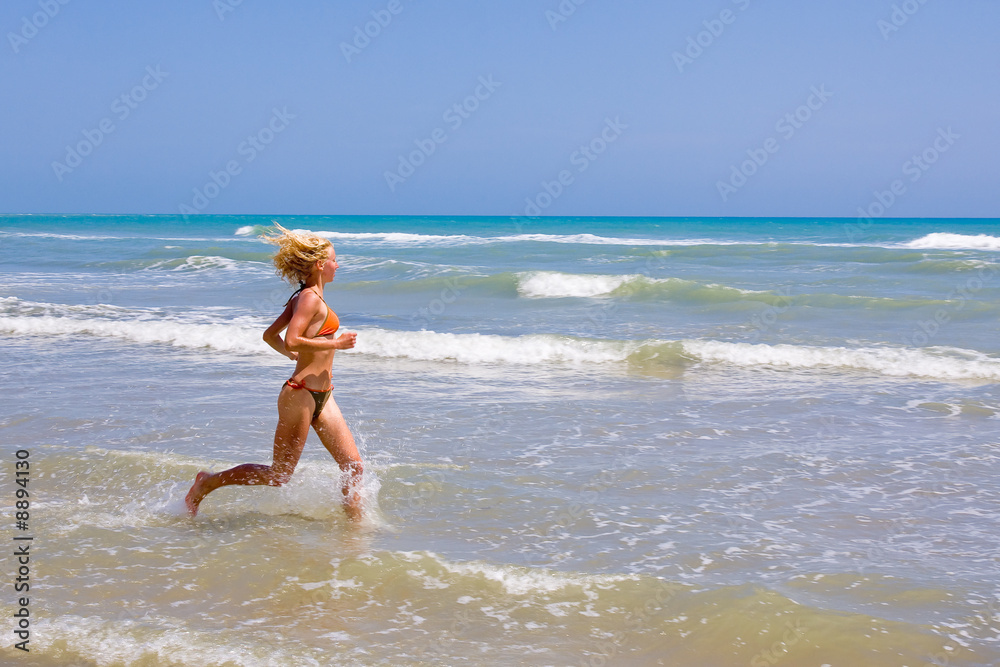 a beutiful woman on the beach in Mediterranean a beutiful woman on the beach in Mediterranean
