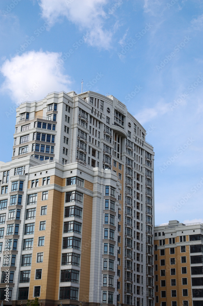 modern residential construction against blue sky