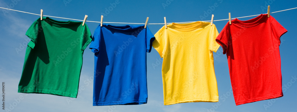 a set of primary colored T-shirts hanging on a clothesline Stock Photo |  Adobe Stock