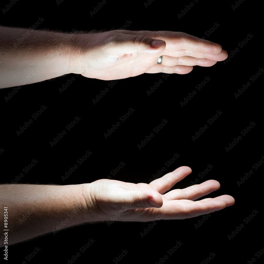 Glowing Hands on Black Background Ready for Your Product.