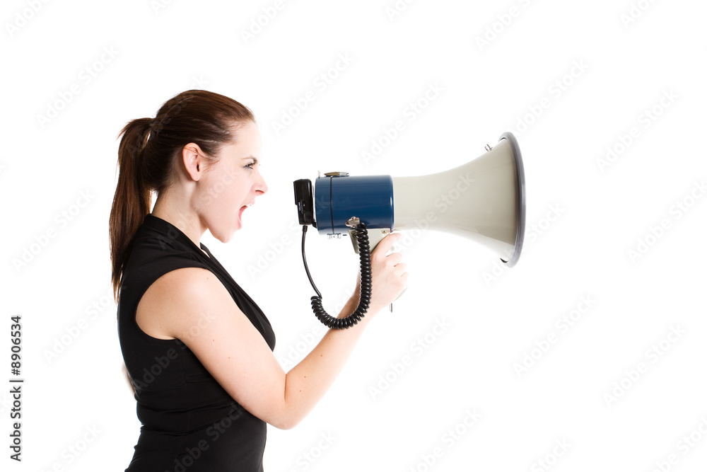 A caucasian businesswoman shouting through a megaphone A caucasian businesswoman shouting through a megaphone