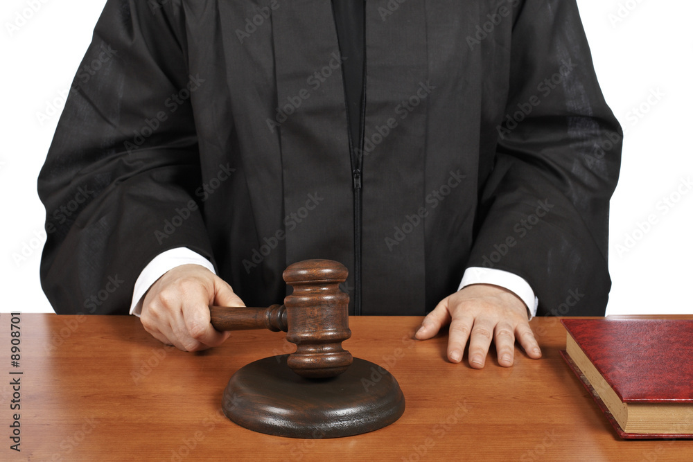 A female judge in a courtroom. Shallow depth of field A female judge in a courtroom. Shallow depth of field