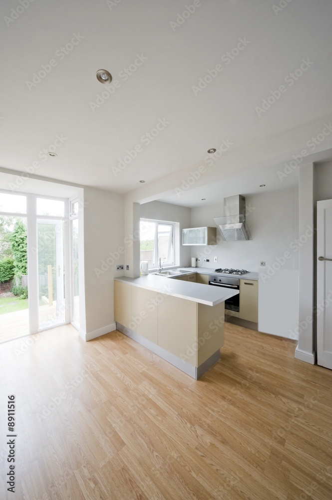 Fototapeta premium colour image kitchen in newly restored rebuilt house