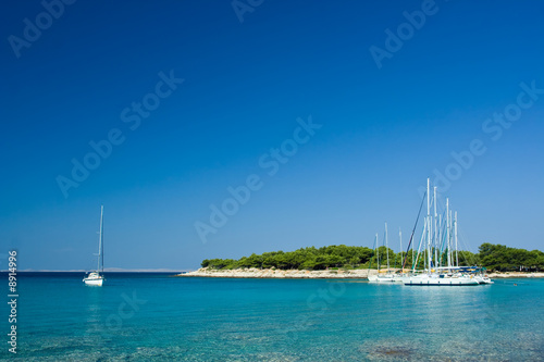 Sail boats docked in beautiful bay, Adriatic sea, Croatia