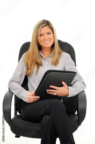 Woman Sitting In A Chair On...