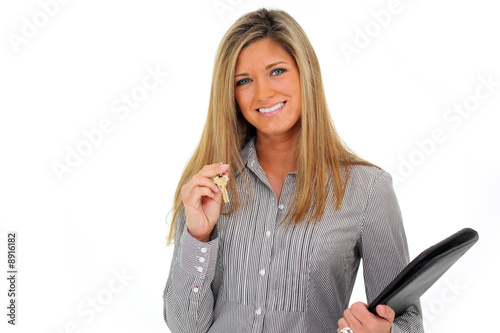 Woman Holding a Set of Keys...