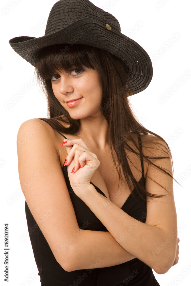 young woman in black hat on a white background young woman in black hat on a white background