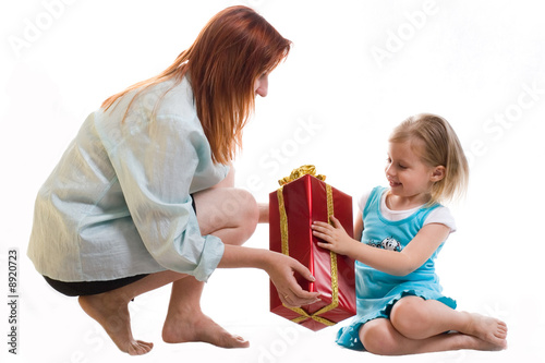 Mum gives the daughter a gift
