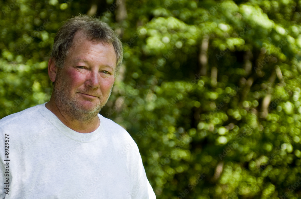 middle age man wooded backyard background unshaven beard stubble middle age man wooded backyard background unshaven beard stubble
