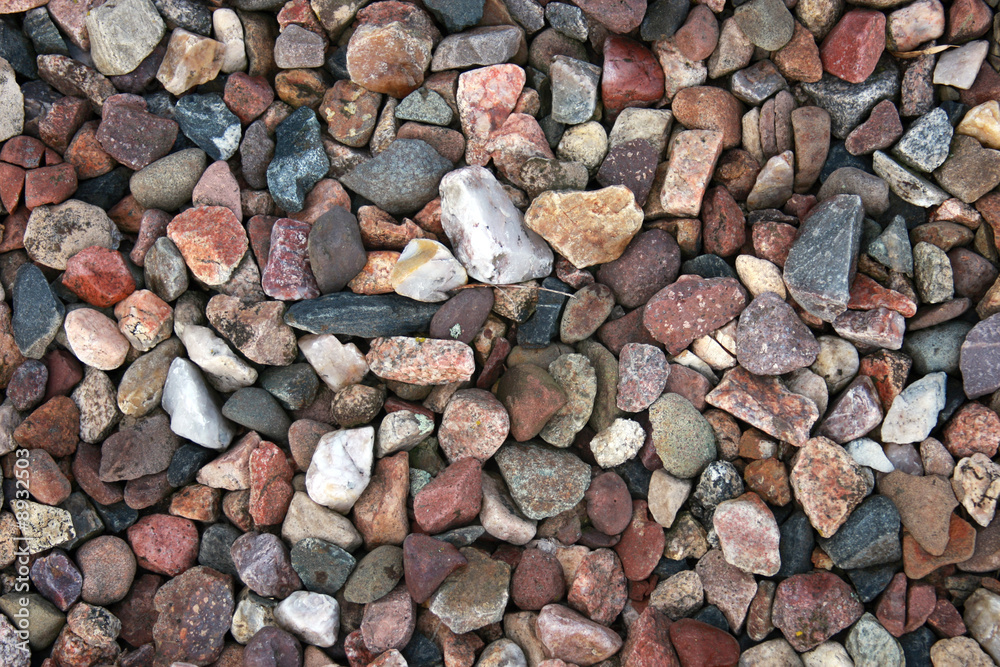 multi colored river rock makes a stone background multi colored river rock makes a stone background