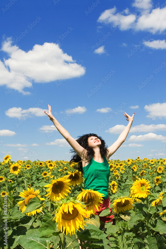 fun woman in the field of sunflowers fun woman in the field of sunflowers